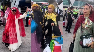 Viral Penampilan Nyentrik Jemaah Haji Makassar Turun dari Pesawat, Bikin Pangling dengan Gaun Mewah dan Emas Berlapis