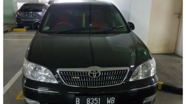 Diselimuti Debu, Penampakan Toyota Camry Diduga Milik Harun Masiku yang Parkir di Thamrin Residence