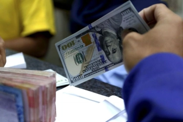 The Fed Pangkas Suku Bunga Acuan, Rupiah Pagi Naik Tipis