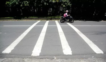 Hindari Kerusakan Motor dengan Teknik Berkendara di Jalan Tidak Rata, ini 5 Tipsnya