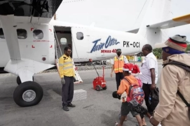 PTFI Gelar Christmas Flight & Boat Layani Mudik Natal Karyawan dan Keluarga ke Pedalaman Papua