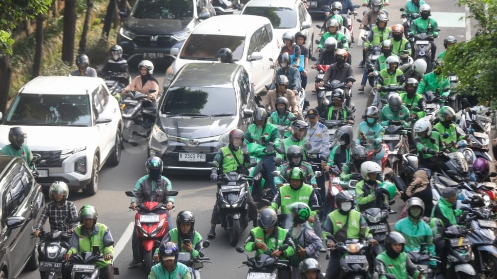Komisi Ojol Turun Jadi 8%, Ekonom Sebut Gojek dan Grab Bisa Bertahan Andalkan Ekosistem Digital